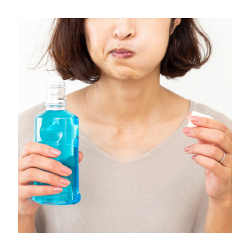 Image of a person with mouthwash